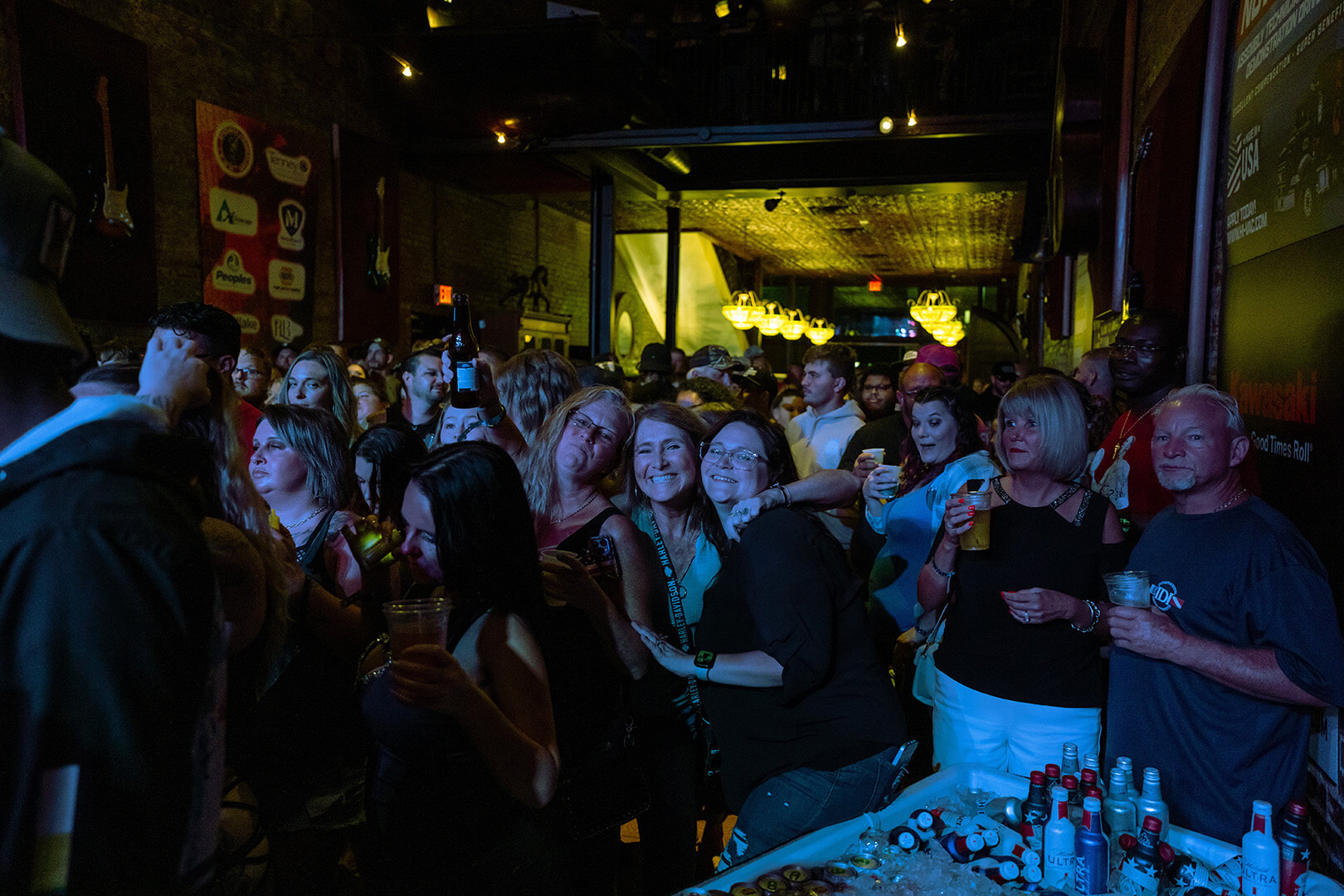 Engaged crowd enjoying live music and drinks at The Adelphia